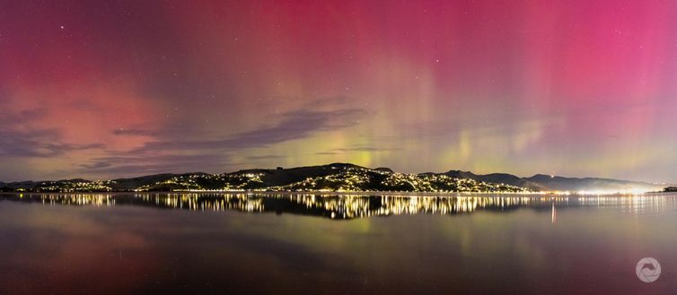 Christchurch Port Hills with Aurora Australis Reflection